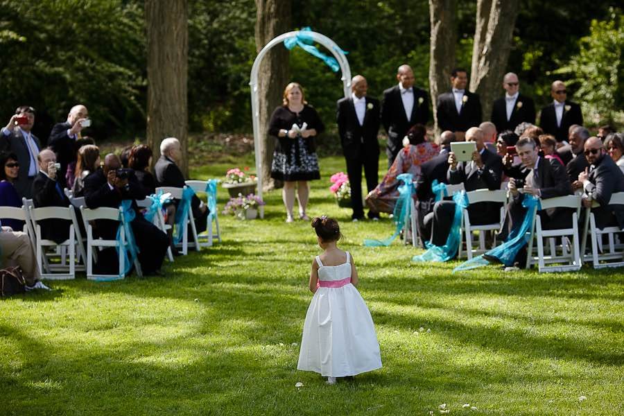 Outdoor wedding ceremony on the mansion lawn